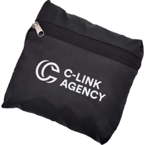 A black travel bag with a zip closure and a logo on the front, compactly folded.