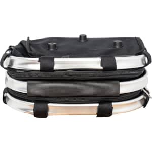 A black Miami Picnic Cooler with silver accents, featuring zippers and straps, displayed in a folded position.
