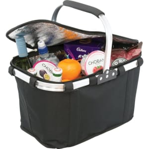 A black picnic cooler bag with a silver handle, filled with drinks, snacks, and an orange, featuring a logo.