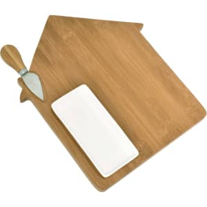 A bamboo cheese board shaped like a house, featuring a cheese knife and a white rectangular dish.