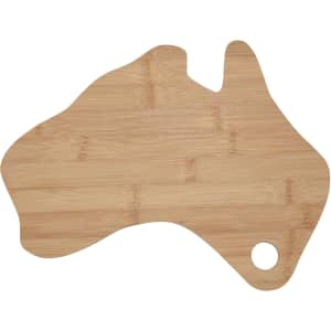 A bamboo cheese board shaped like Australia, featuring a natural wood finish and a circular hole for hanging.