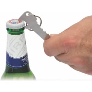A drink bottle opener in silver is being used to open a bottle, with a keyring attached.