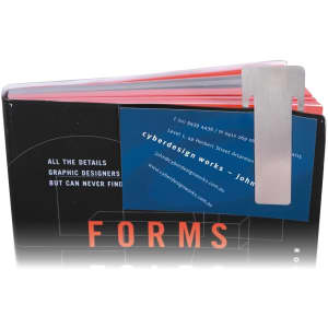A silver rectangle clip on a black and red book, holding a blue business card with a logo.