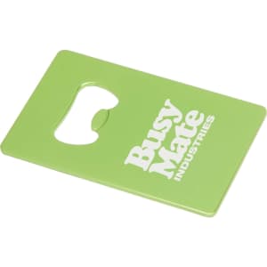 A green, rectangular bottle opener with a cut-out for opening caps and a logo on the surface.
