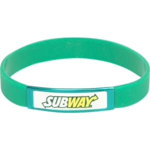 A green silicone wristband featuring a logo insert. Ideal for promotional events and exhibitions.