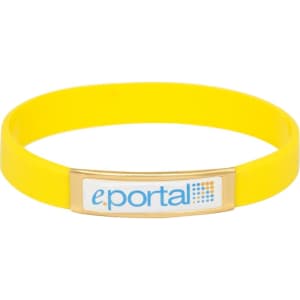 A yellow silicone wristband featuring a rectangular gold plaque with a logo.