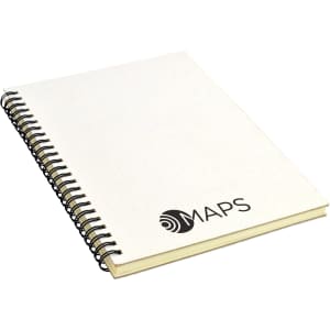A white A5 notebook with a spiral binding and a logo on the cover, featuring lined pages inside.