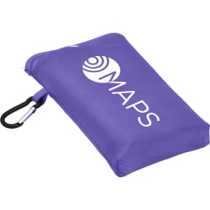 A purple compact picnic mat with a carabiner clip, featuring a logo on one side.