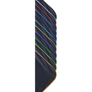 A compact picnic mat with a black surface and various coloured edges, featuring a branding logo.