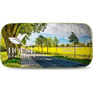 A full-colour sunshade featuring a scenic landscape with trees and a road, predominantly in green and yellow tones.