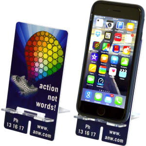 A smartphone stand featuring a colourful design with a logo, holding a phone displaying various apps.