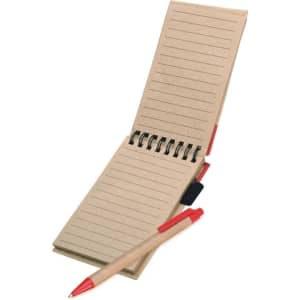 A notepad with a natural brown cover and red accents, accompanied by a wooden pen. It has spiral binding and lined pages.