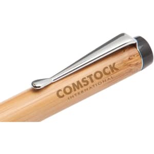 A bamboo pen with a shiny silver clip and a branding logo on the barrel.