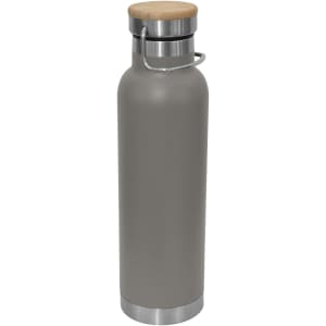 A drink bottle with a grey stainless steel body and a bamboo lid, featuring a metal handle.