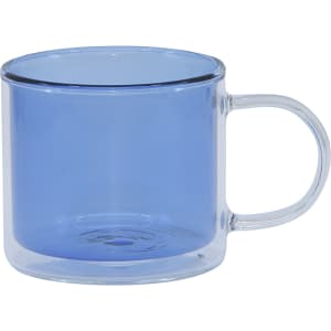 A blue double wall mug made of glass, featuring a transparent handle and a sleek design.