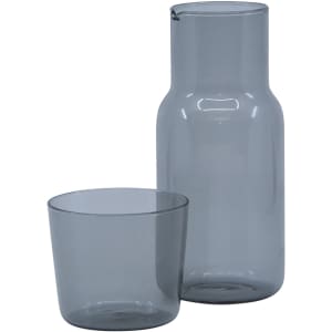 A drink bottle and tumbler set in sleek grey glass. The bottle features a smooth design with a matching tumbler.