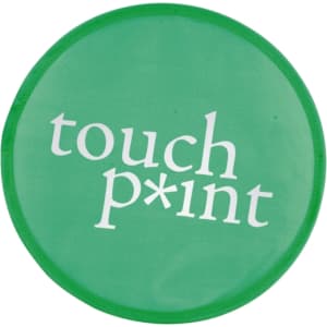 A green frisbee with a circular shape and a logo in white text.