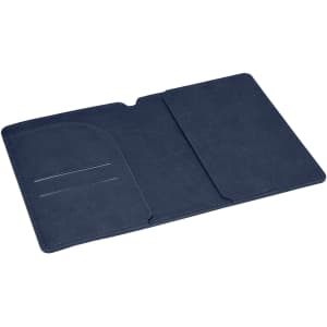 A navy blue passport wallet with a pocket and card slots, featuring a smooth textured finish and an interior section.