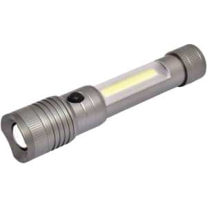 A gunmetal torch featuring a dual light function, with a clear section and a textured grip.