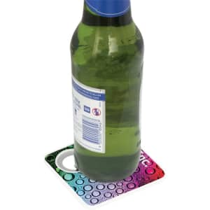 A drink bottle rests on a multicoloured coaster with a bottle opener, featuring a textured water droplet design.