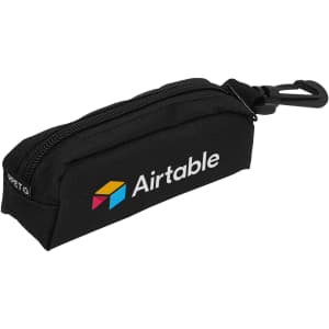 A black pouch with a zip closure and a clip, featuring a logo on the side.