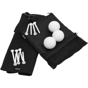 A black pouch contains three white golf balls and several white tees. The pouch features a mesh section.