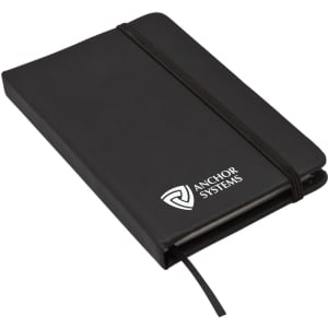 A black notebook with an elastic band closure and a logo on the cover. It features a ribbon marker inside.