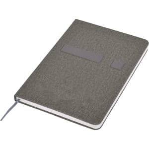 A green Oslo A5 notebook with a textured cover, an elastic closure, and a ribbon bookmark.