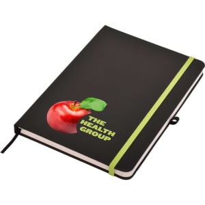 A black A5 notepad with a green elastic band and a logo featuring a red apple.