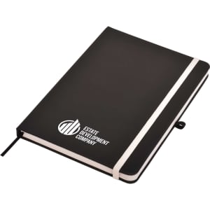 A black A5 notepad with a white elastic band and a logo on the cover.