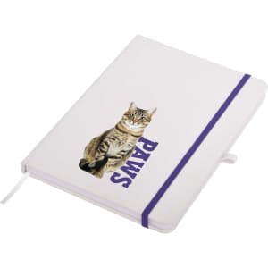 A white A5 notepad with an illustration of a cat and the word "PAWS" in purple, featuring a purple elastic band.