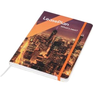 A full-colour A5 notebook featuring a city skyline design, with an elastic band and a ribbon bookmark.