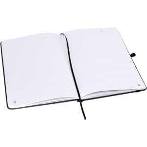 A black A5 notebook opened to reveal blank lined pages and a ribbon bookmark. It includes a branded logo.