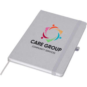 A grey A5 notebook with an elastic band closure and a logo on the front, featuring colourful graphic elements.