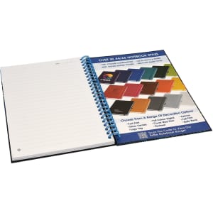 A side-bound A5 notebook with a blue spiral binding, featuring blank pages and a selection of colour options shown alongside.