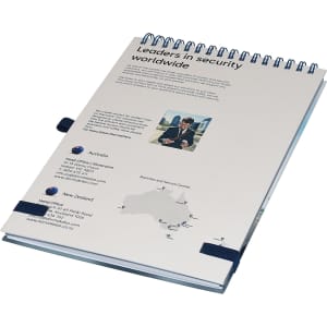 A light grey A5 notebook with a spiral binding, featuring a logo and contact information on the cover.