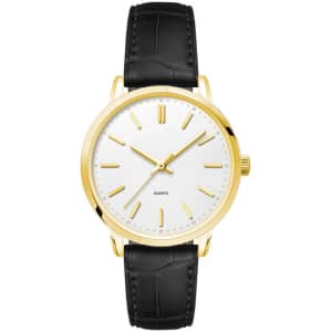 A gold ladies dress watch with a white dial and a black leather strap, featuring a minimalist design and a logo.