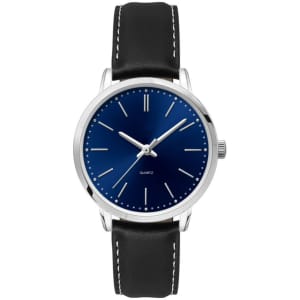 A ladies dress watch featuring a silver case, blue dial, and a black leather strap with white stitching.