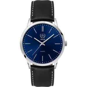 A men's dress watch with a blue dial and silver-tone hands, featuring a black leather strap and a logo.
