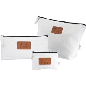 A set of three white fabric bags with black zippers and a branded leather patch.