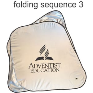 A silver sunshade with a black logo, featuring a compact, foldable design for easy storage.