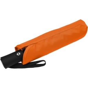 A black fold-up umbrella placed inside an orange sleeve with a carrying strap.