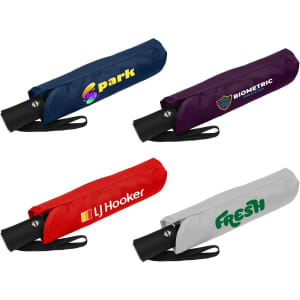 A collection of four folded umbrellas in navy, purple, red, and grey, each with a logo.