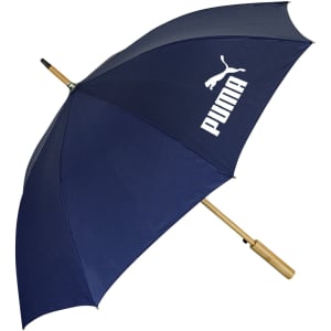 A navy umbrella with a wooden handle and branding on the canopy.
