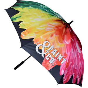 A vibrant umbrella featuring a floral design in yellow and pink hues, with a black background and a logo.