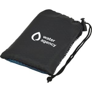 A black microfibre towel neatly folded in a pouch with a mesh bottom and a logo.