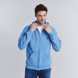 A blue heavy blend adult full zip hooded sweatshirt with a front pocket and a hood, worn by a man.