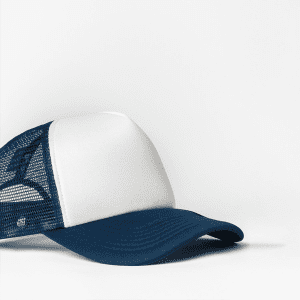 A navy and white trucker cap featuring a mesh back and a front panel with a logo.