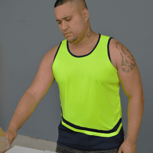 A bright high-visibility yellow and navy blue singlet with a logo, worn by a person at a table.