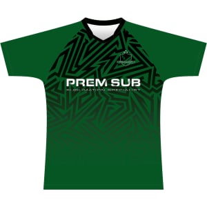 A green football jersey with a black geometric pattern and a logo. Features a short raglan sleeve design.